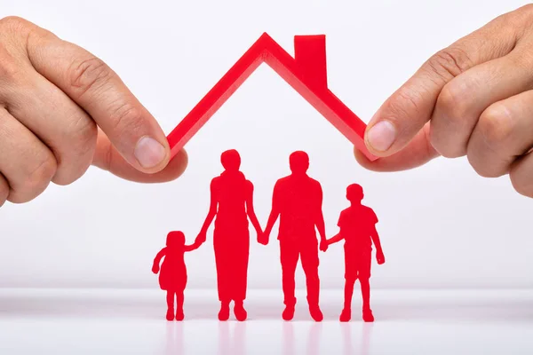 Person Hand Protecting Family Figures Roof — Stock Photo, Image