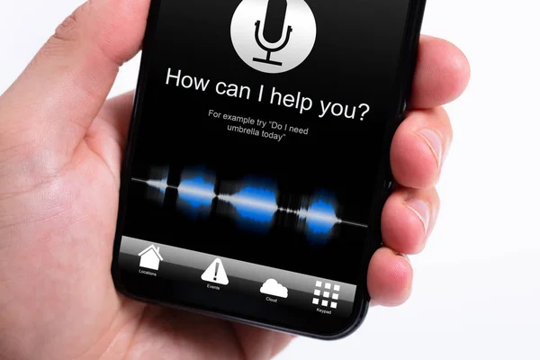 Person Using Voice Recognition Function On Mobile Phone