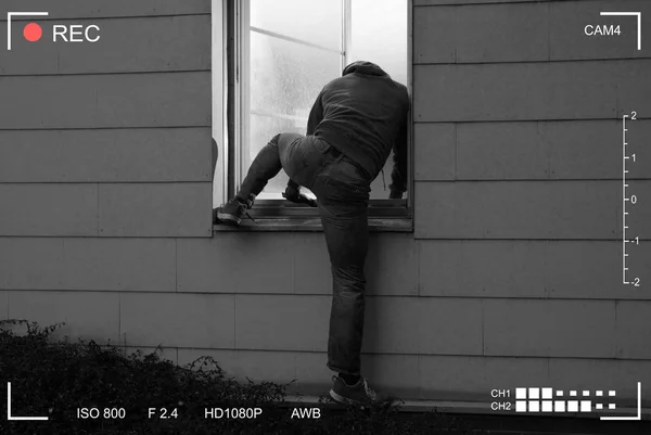 Rear View Burglar Entering House Open Window — Stock Photo, Image