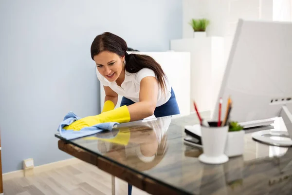 Side View Female Janitor Cleaning Desk Blue Napkin Office — Stock Photo, Image