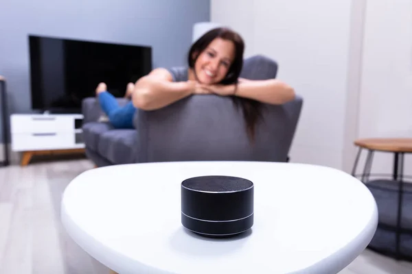 Close Wireless Speaker Front Woman Sitting Sofa — Stock Photo, Image