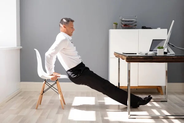Side View Young Businessman Doing Triceps Dips Office — Stock Photo, Image