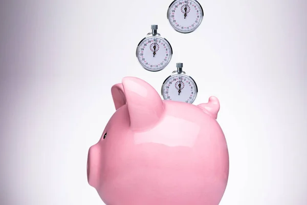 Close Pink Piggy Bank Stopwatch White Background — Stock Photo, Image