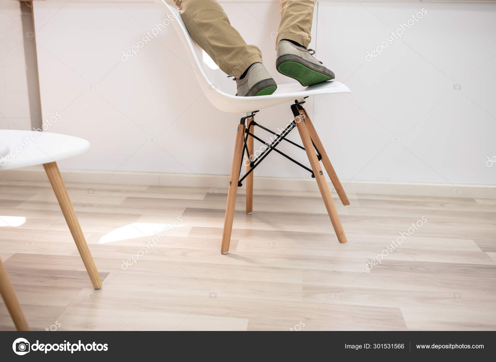 Man Standing Chair Fall Floor Stock Photo by ©AndreyPopov 301531566