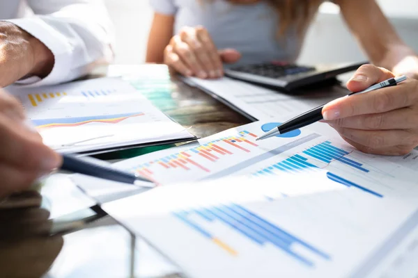 Mid Section Two Businesspeople Analyzing Graph Office Desk — Stock Photo, Image