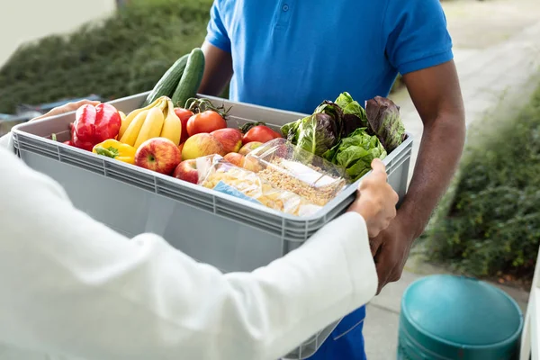 Smiling Woman Receiving Grocery Delivery Home — Stock Photo, Image