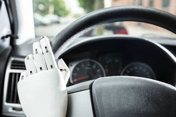 Close Robotic Hands Car Steering Wheel — Stok Foto