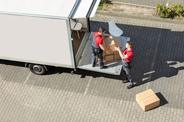 Overhead View Male Movers Unloading Cardboard Boxes Form Truck Street — Stock Photo, Image