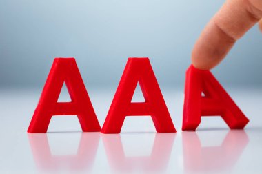 Credit Rating Decrease From AAA to AA Concept clipart