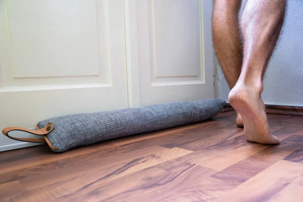 Person Walking Barefoot Draft Excluder Door Blocking Cold Air Traveling — Stock Photo, Image