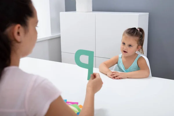 Cute Little Girl Speech Therapist Office Learning Letter — Stock Photo, Image