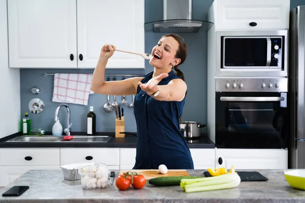 Woman Dancing Singing While Cooking Kitchen — Stock Photo, Image