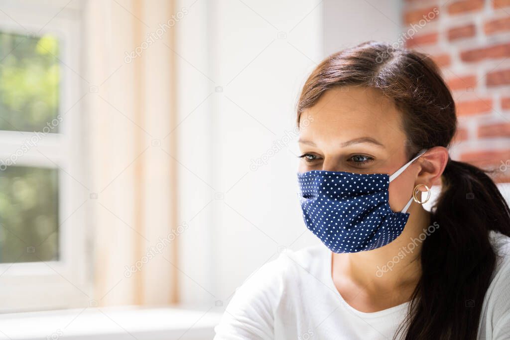 Woman In Reusable Cloth Face Mask. Covid-19 Quarantine Fashion