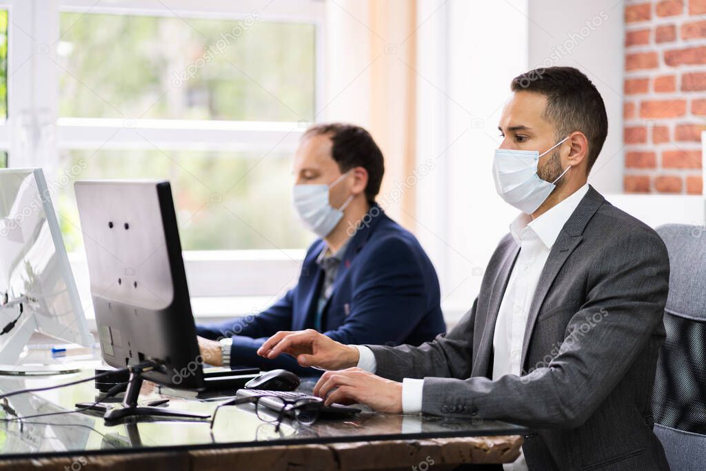 Customer Service Support Agents In Headsets And Face Masks