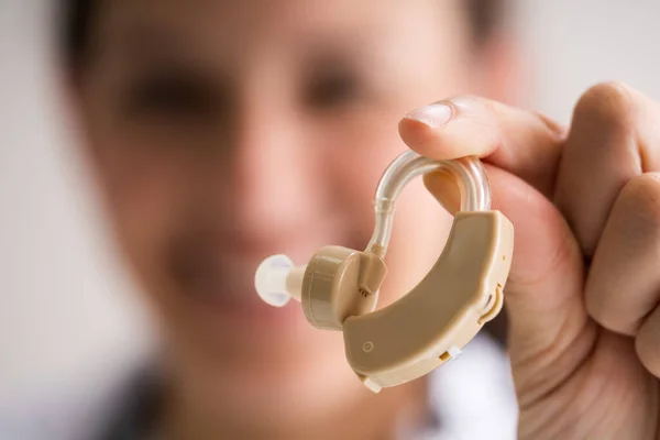 Audiologist Doctor Holding Hearing Deaf Aid Hand — Stock Photo, Image