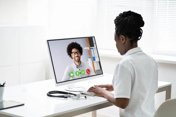 African Doctor In Video Conference Call Talking With Patient