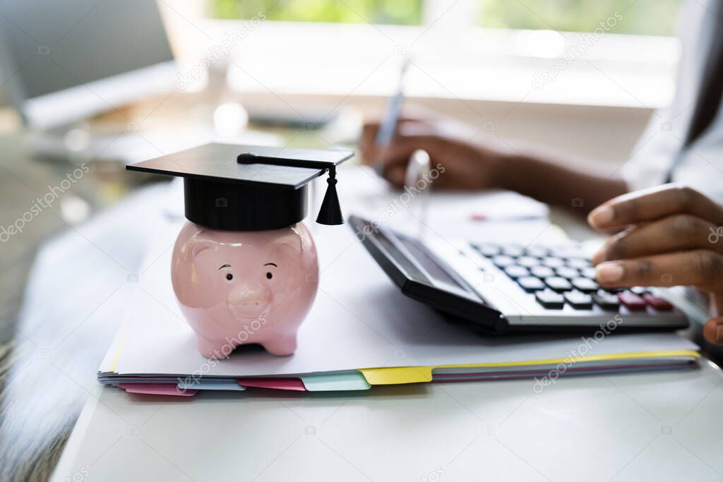 African American Women Accounting With Graduation Cap