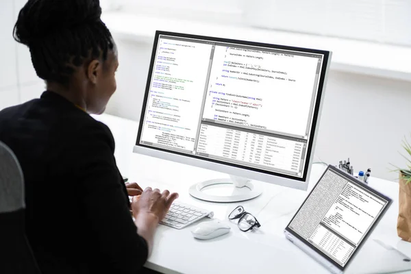 African Programmer Coder Using Multiple Monitor Screens — Stock Photo, Image