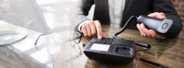 Corporate Landline Telephone Call At Office Desk