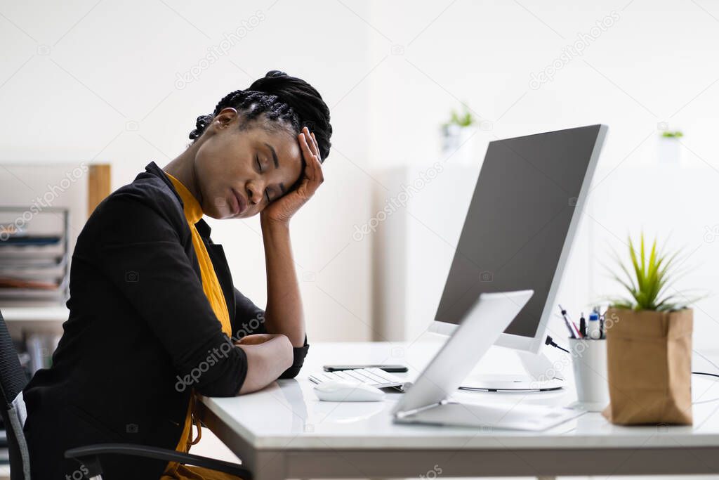 African Business Woman Tired And Upset With Head Ache