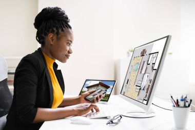 African American Home Assessor Woman Using Computer clipart