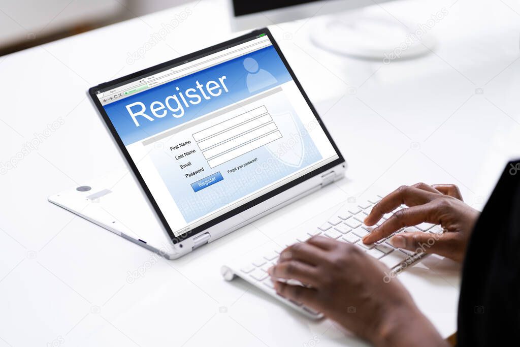 Online Web Registration Form On Website Using Laptop