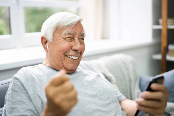 Smiling Older Senior Listening Music Mobile Phone — Stock Photo, Image