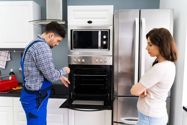 Oven Appliance Repair And Maintenance By Technician