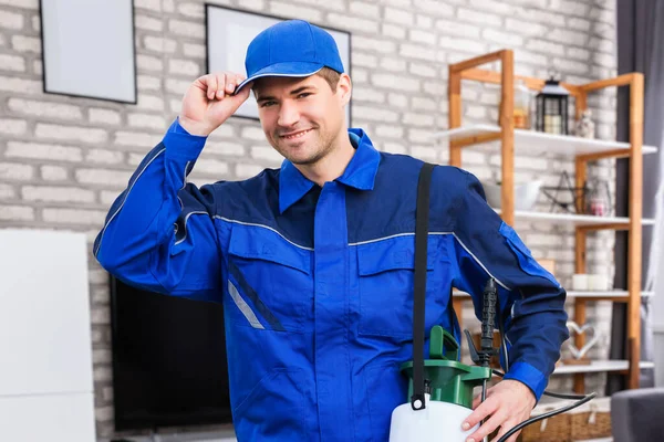 Pest Control Service Man At Home Smiling