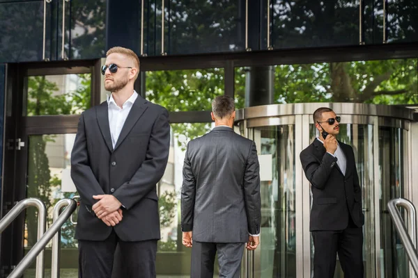 Security Guard Service Protecting Business Man Outside