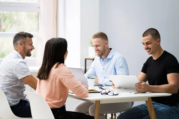 Meeting Business At Conference Table. Diverse Professional Persons