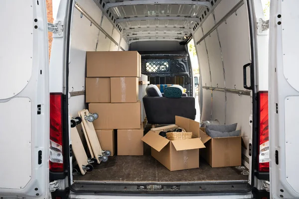 Van With Boxes On Street From Relocation Service Business