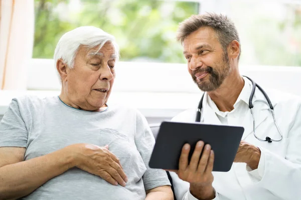 Home Care Elder Patient Looking Xray Images Shown His Doctor — Stock Photo, Image