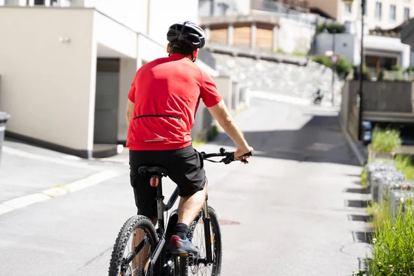 Electric Bicycle Outdoors In City. Modern Urban Transportation