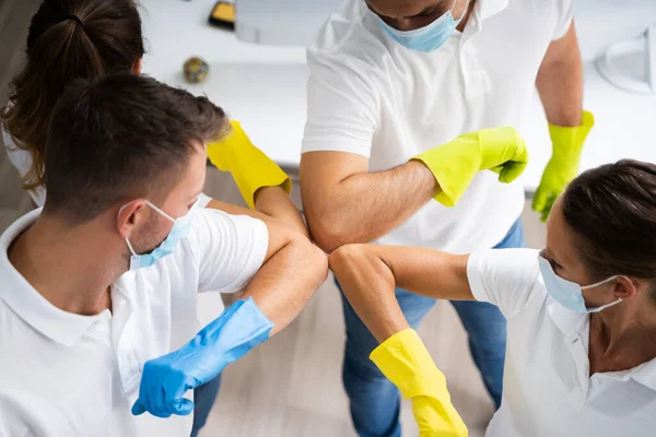 Professional Office Cleaning Janitor Team Spirit Huddle Face Masks — Stock Photo, Image