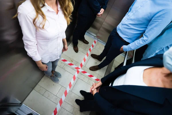 Social Distancing Marks on Floor In Elevator