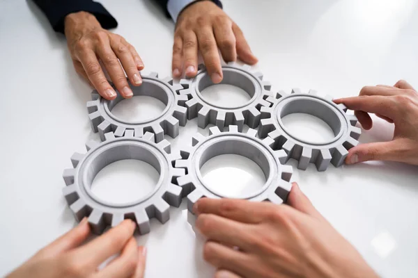 Innovative Businesspeople Team Hands Joining Gears Desk — Stock Photo, Image