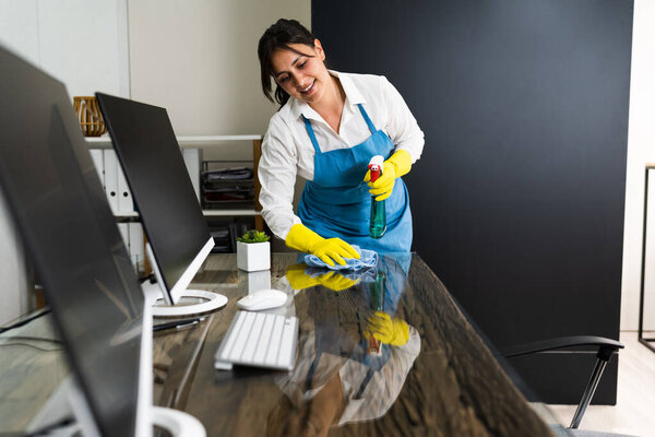 Janitor Cleaning Office Desk. Hygiene Cleaner Service