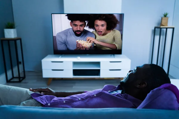 African Man Watching Movie Television — Stock Photo, Image
