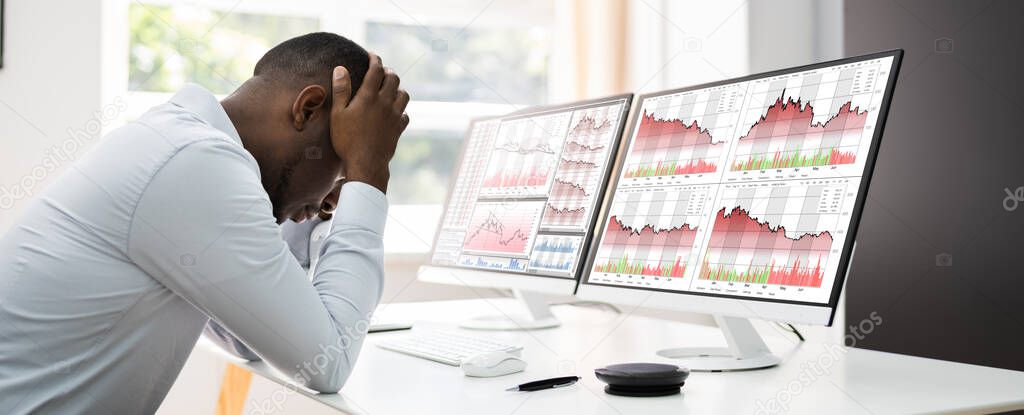 Businessman With Financial Loss From Stock Market Down Fall