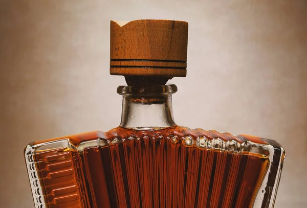 Accordeon Fles Gemaakt Van Glas Als Souvenir Grijze Achtergrond — Stockfoto