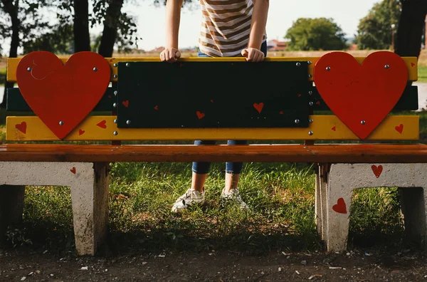Decorated Park Bench Heart Symbols One Girl Back Leaning — Stock Photo, Image