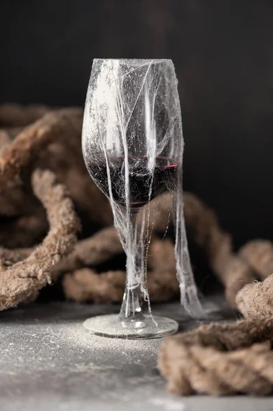 Grunge Wine Glass Red Wine Cobweb Rope Background Dark Cellar — Stock Photo, Image