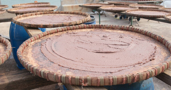 Shrimp paste in baskets at Tai O village of Hong Kong