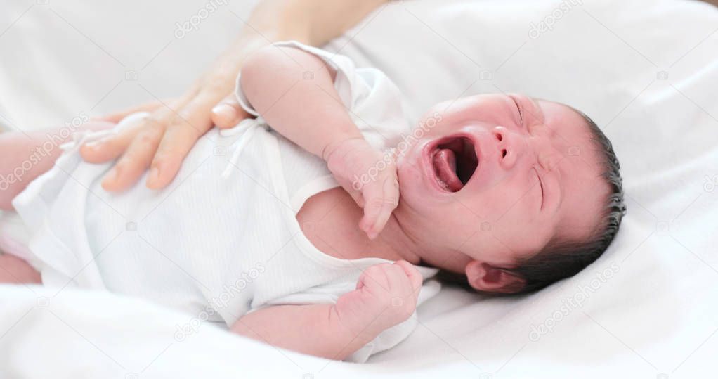 New born baby feeling hungry and crying