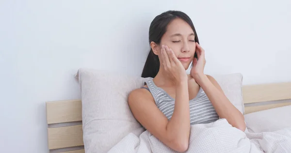 Woman Massaging Her Face Bed — Stock Photo, Image