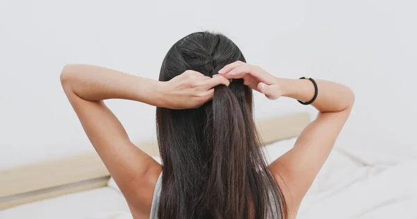 Woman Tied Her Braid Home — Stock Photo, Image