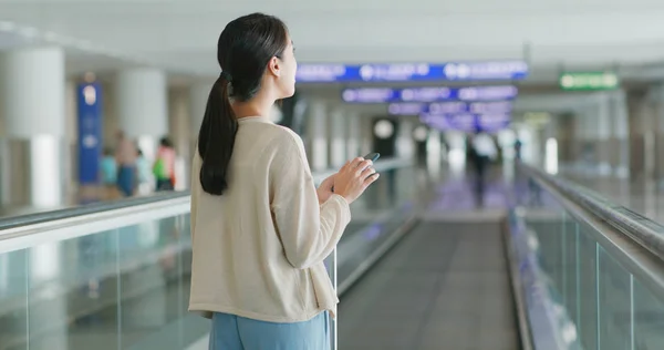 Woman Checking Flight Number Cellphone Airport — Stock Photo, Image