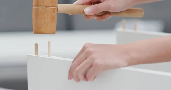 Woman Assembling White Shelf — Stock Photo, Image