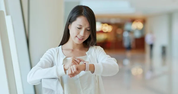 Woman using smart watch